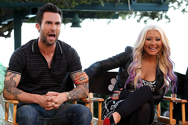 Adam Levine defends fellow coach Christina Aguilera against meanies who talk about her weight. Adam Levine defends fellow coach Christina Aguilera against meanies who talk about her weight.